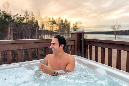 Finnish sauna and outdoor hot tub experience with dinner by the fire