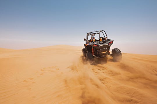 Paseo en camello por la mañana o por la tarde y aventura en buggy.