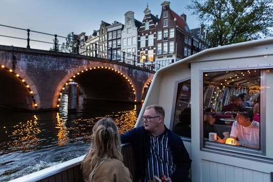 Happy holidays evening cruise in Amsterdam with wine and cheese box