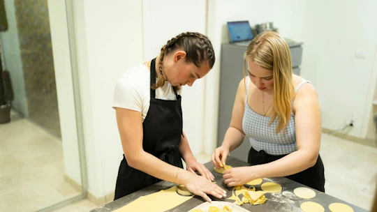 Fresh pasta and tiramisù cooking class with wine pairing in Milan