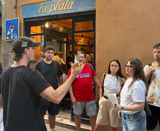 Barcelona district tour with traditional tapas tasting