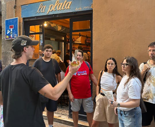 Barcelona district tour with traditional tapas tasting
