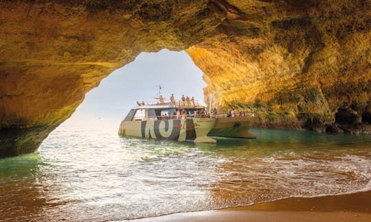 Sunset catamaran tour to Benagil Caves in Algarve
