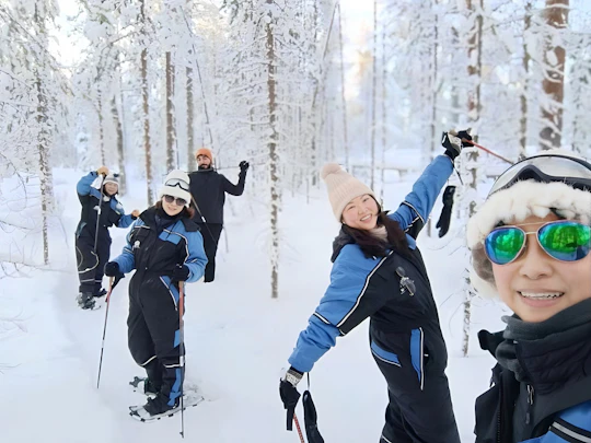 Snowshoe small-group adventure with BBQ at Vikaköngäs from Rovaniemi