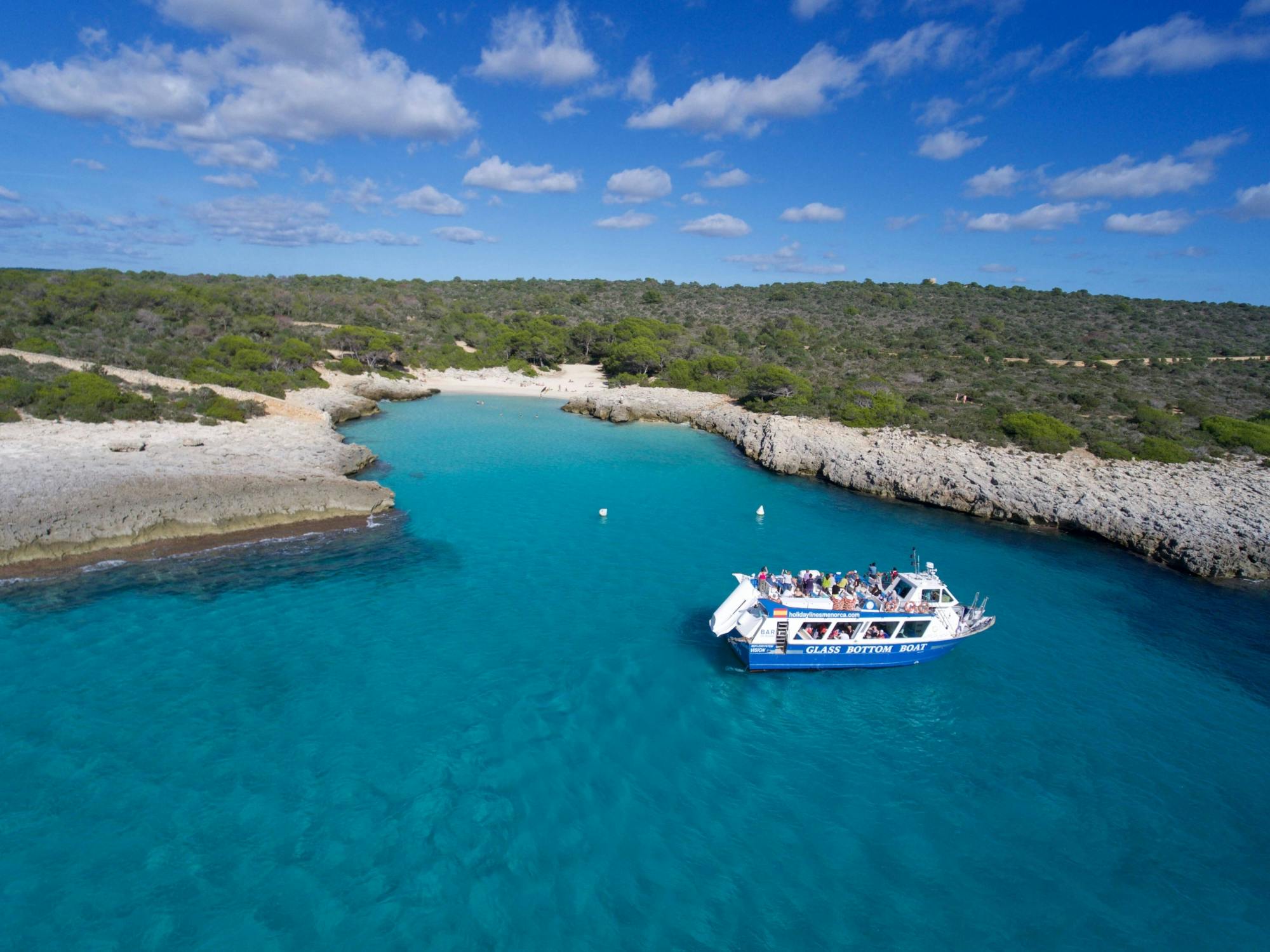 Boat cruise from Cala’n Bosch with snorkelling and onboard bar