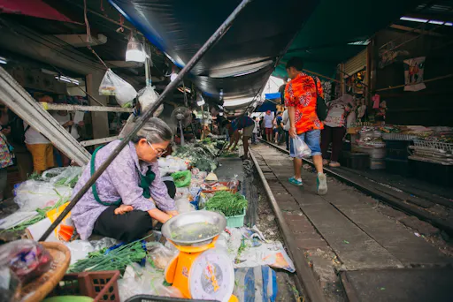 Damnoen Saduak Floating & Maeklong Railway Markets Tour