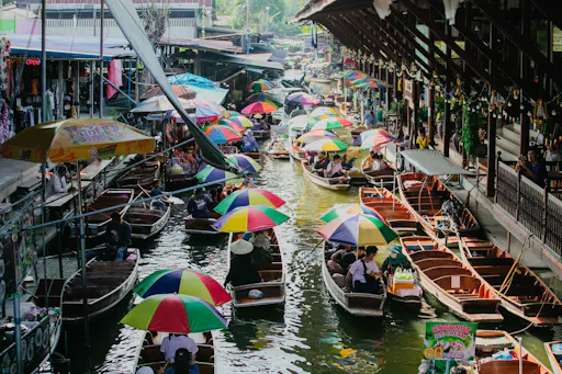 Damnoen Saduak Floating & Maeklong Railway Markets Tour
