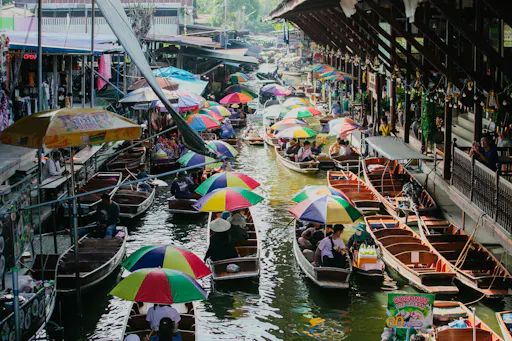 Damnoen Saduak Floating & Maeklong Railway Markets Tour