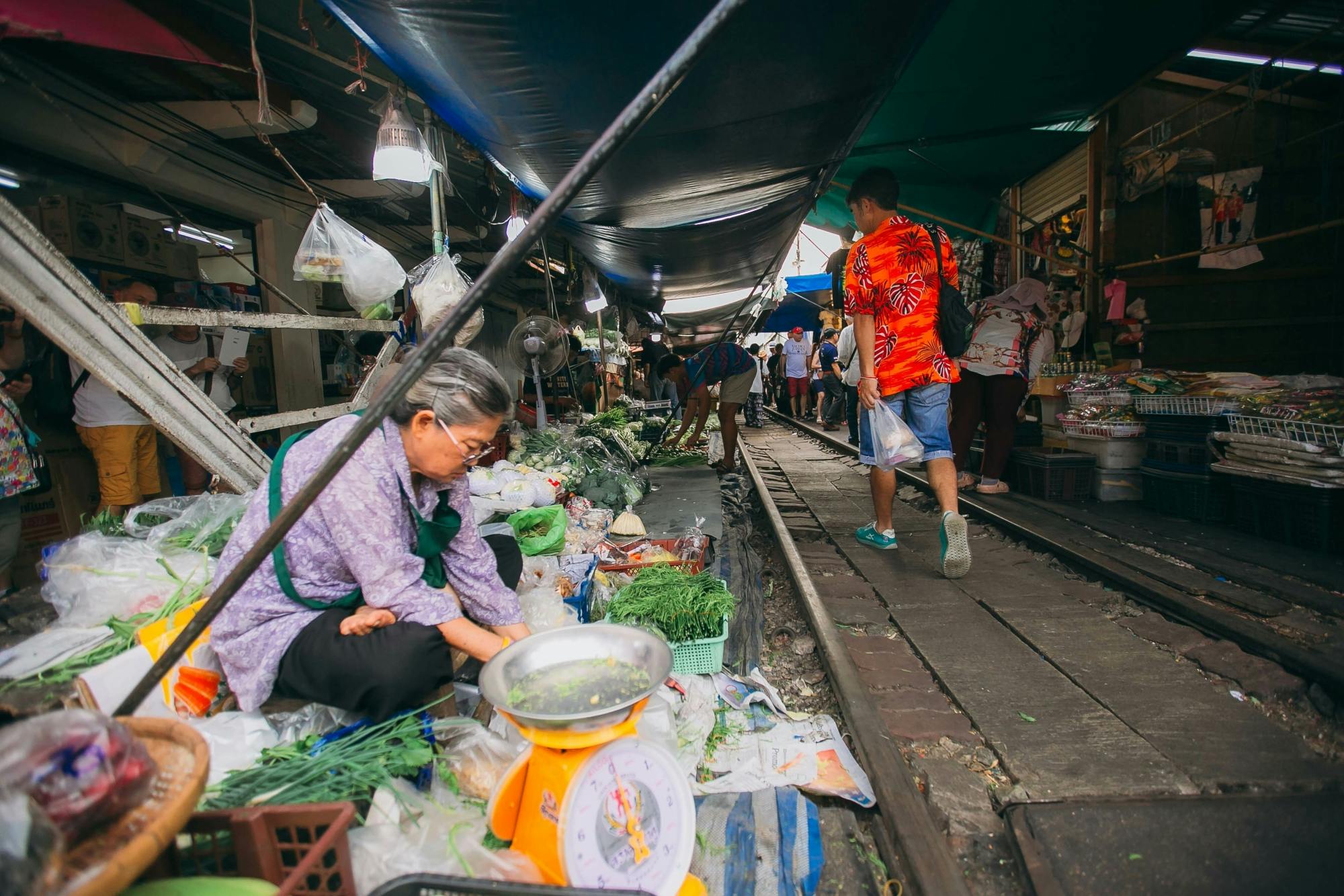 Damnoen Saduak Floating & Maeklong Railway Markets Tour