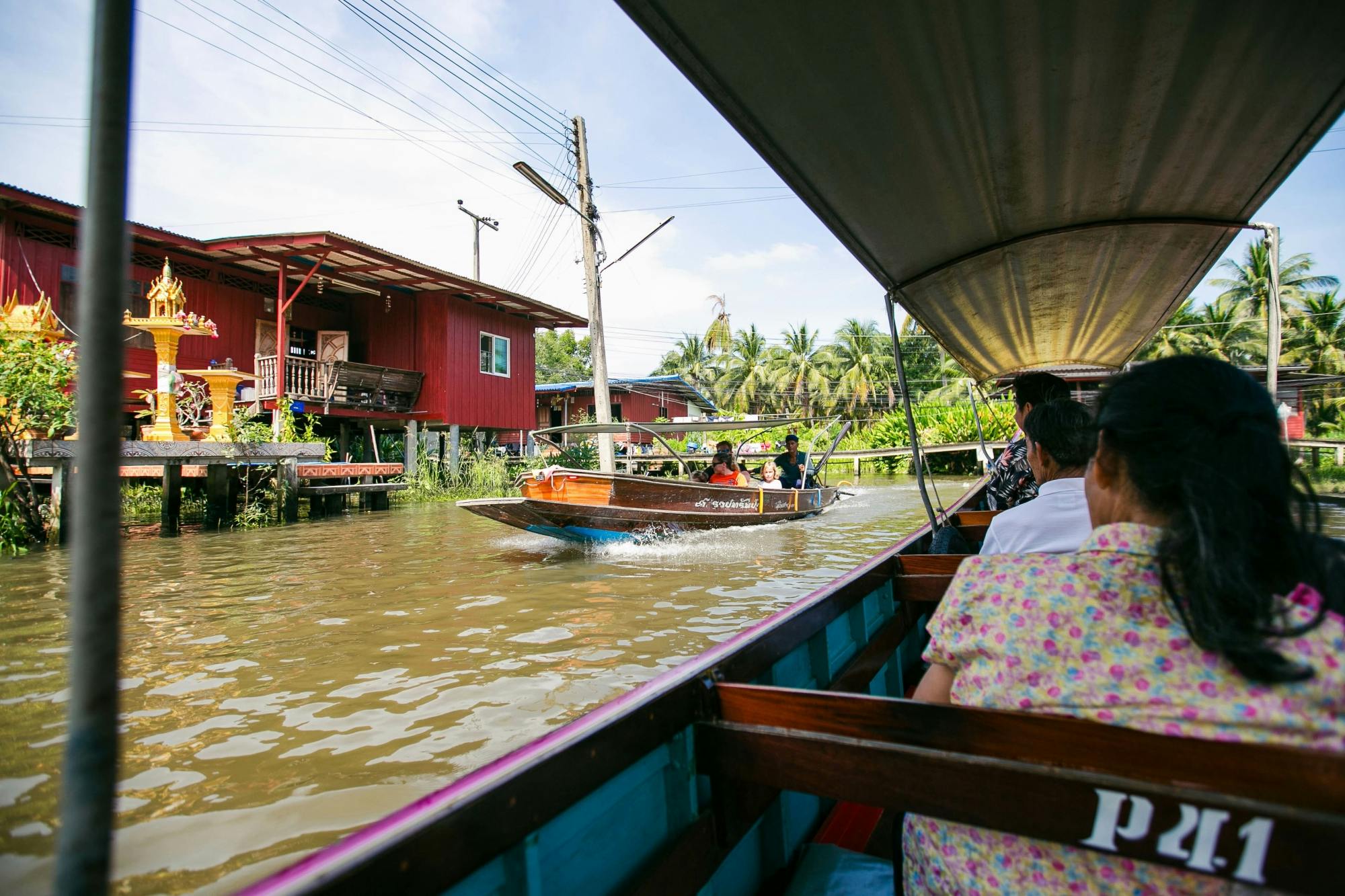 Damnoen Saduak Floating & Maeklong Railway Markets Tour