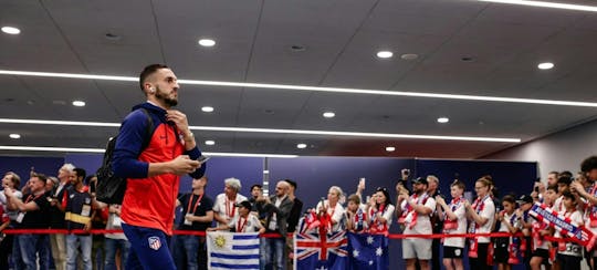 Atlético de Madrid team arrival experience and football match ticket