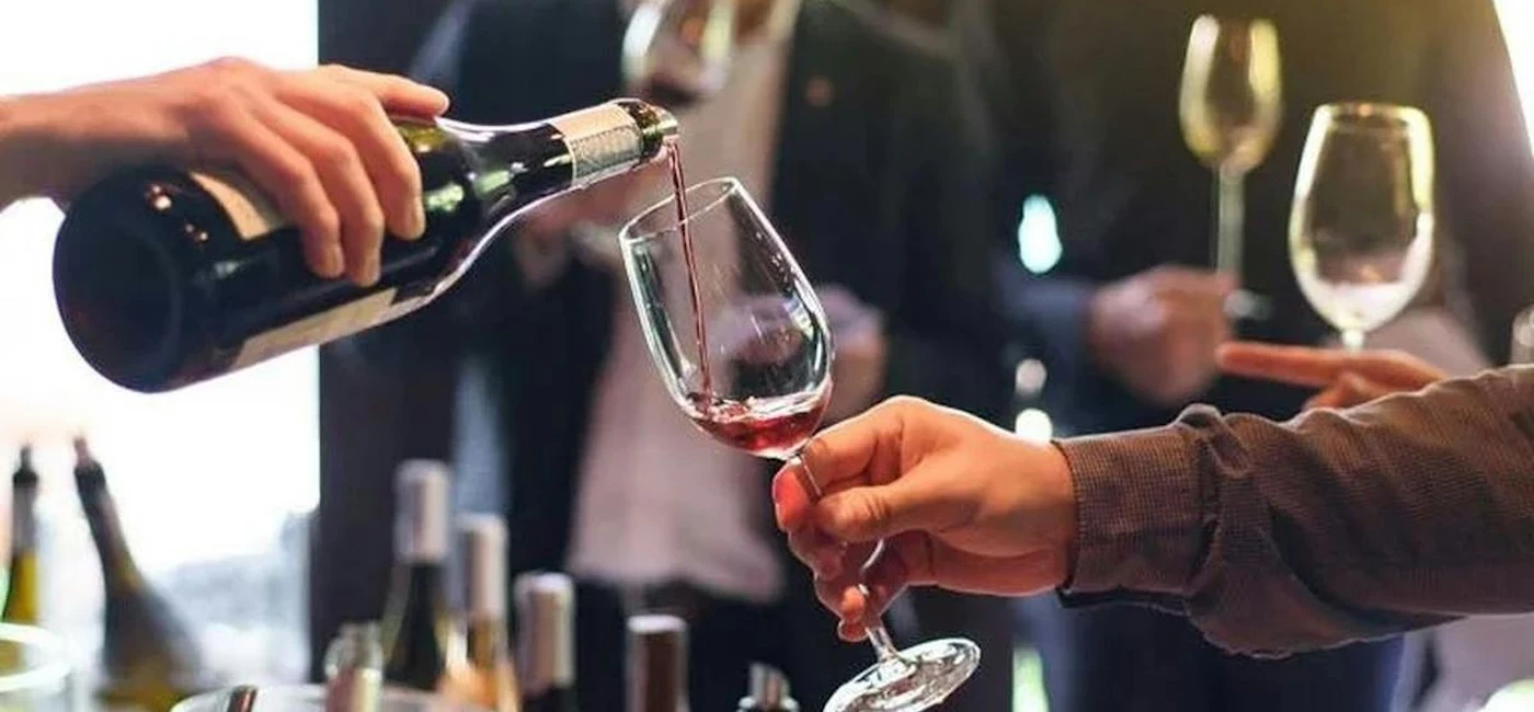 Wine being poured during a guided tasting near Nice on the French Riviera