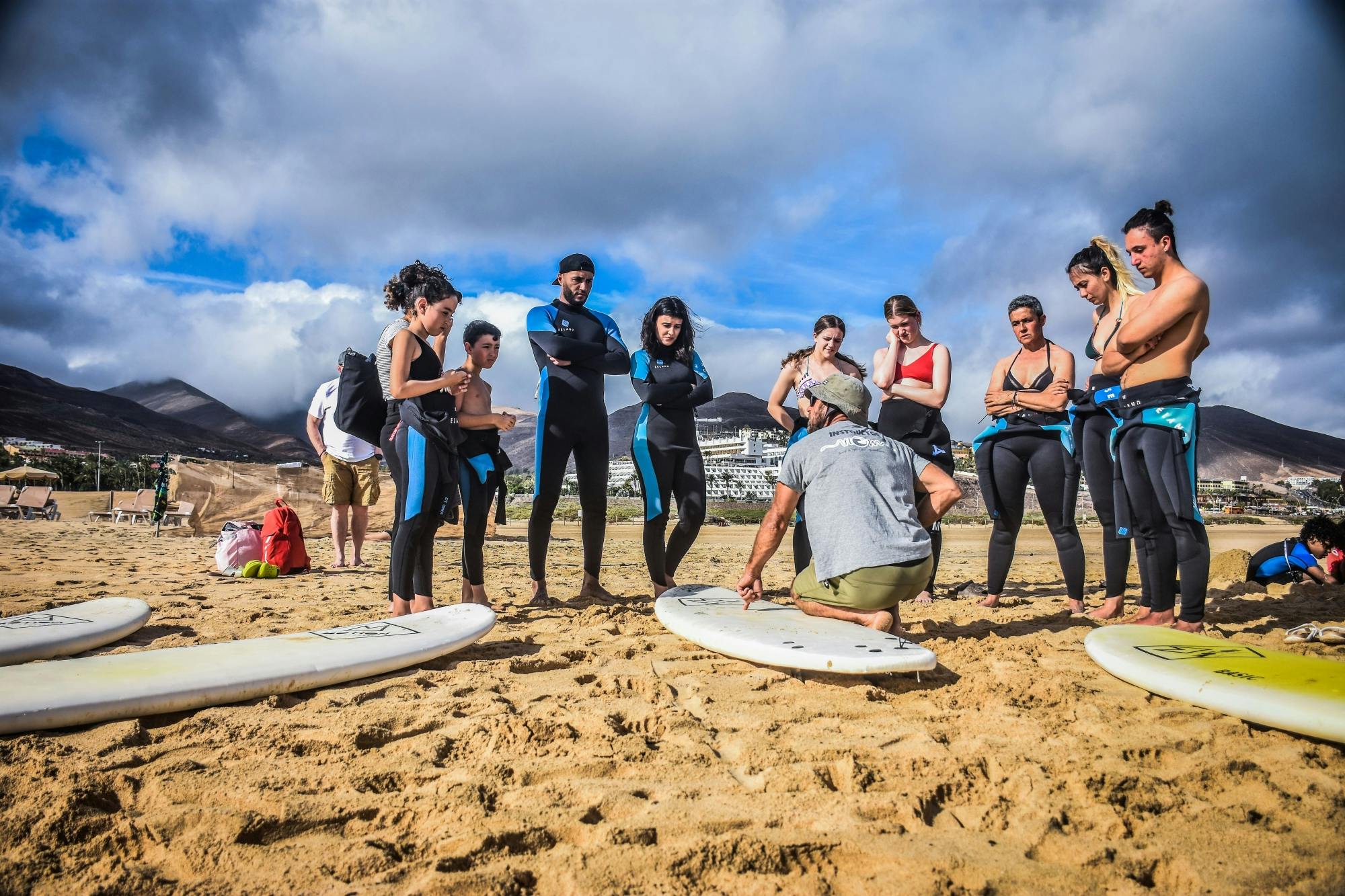 Family surfing session in the south of Fuerteventura