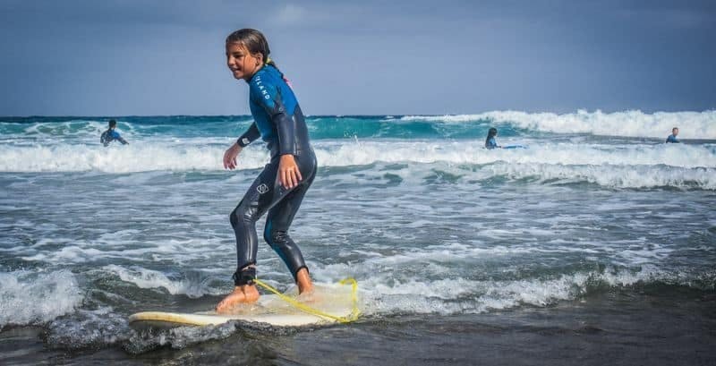 Family surfing session in the south of Fuerteventura