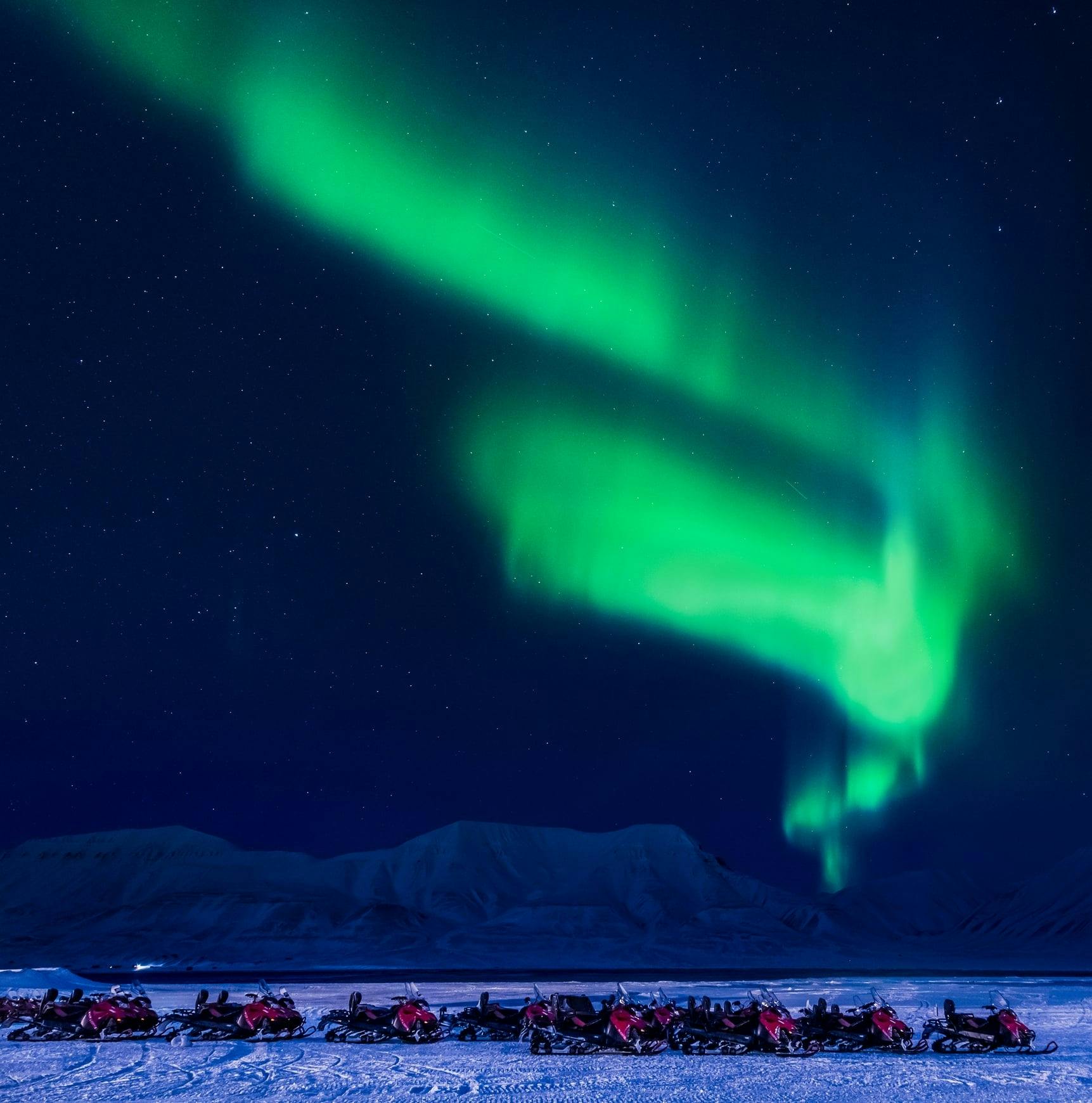 Vuokatti snowmobile Northern Lights safari at dusk