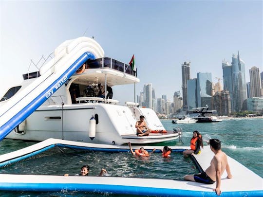 Yacht sailing with waterslides and BBQ from Dubai Harbour
