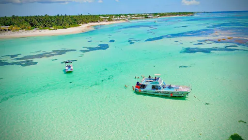 Double-deck catamaran cruise at sunset from Punta Cana