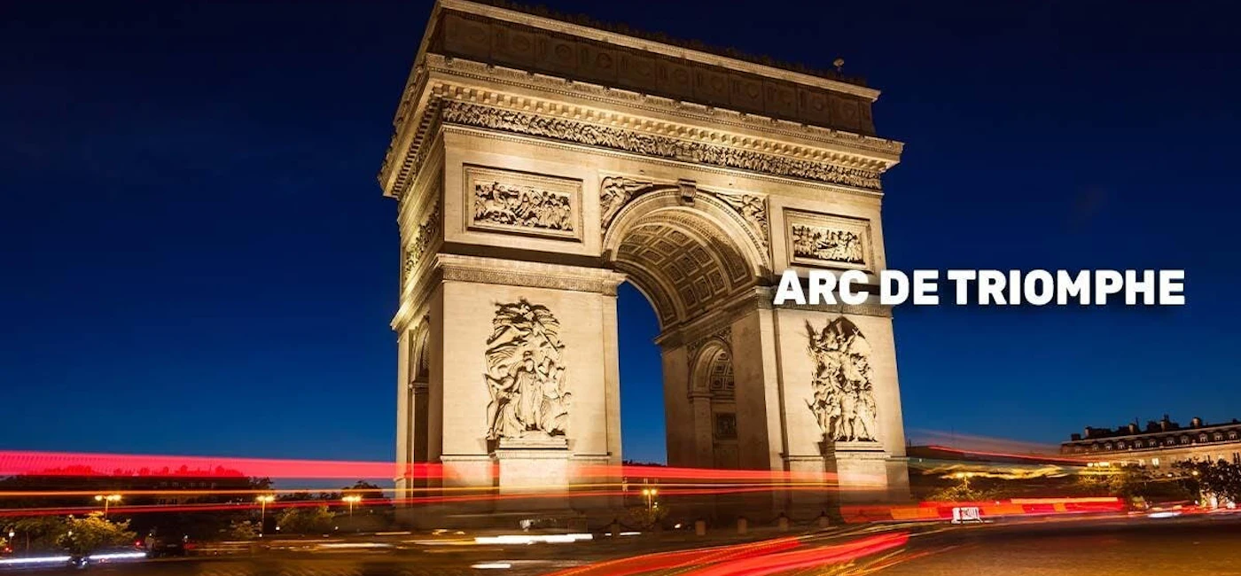Arc de Triomphe at night, a landmark included in many Paris sightseeing itineraries