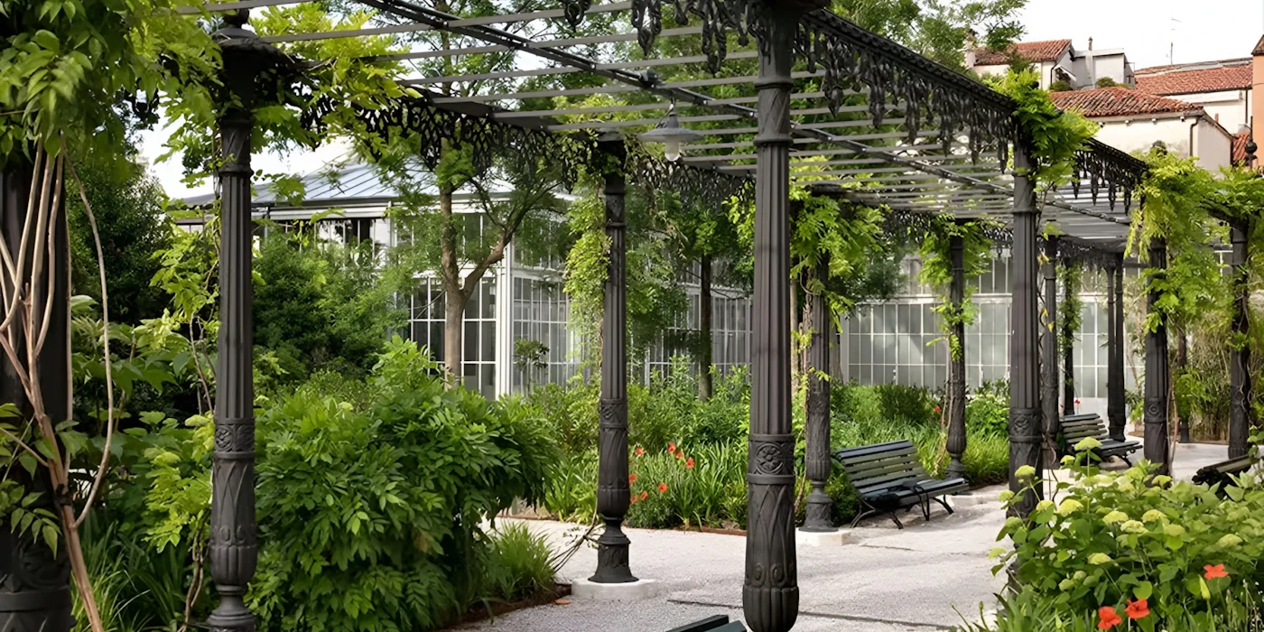 Pergola walkway and greenery inside the Royal Gardens near St. Mark’s Square, Venice