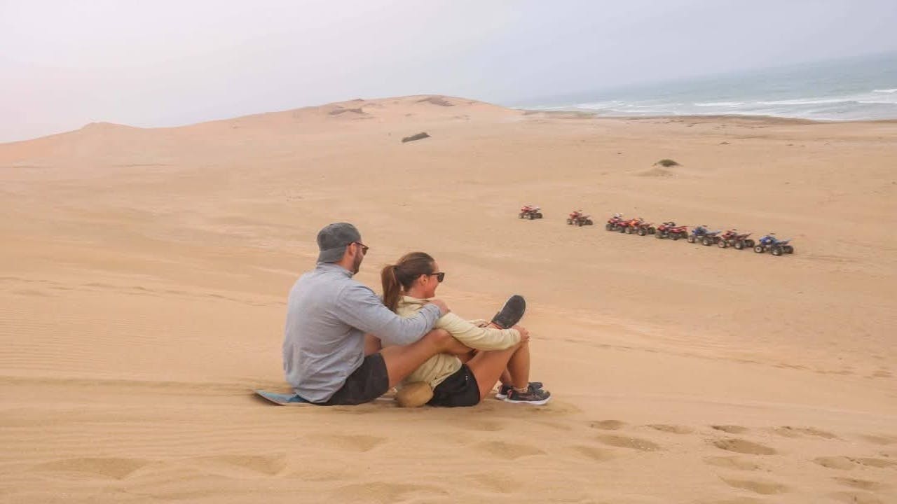 Sunset sandboarding in Agadir desert with Dinner