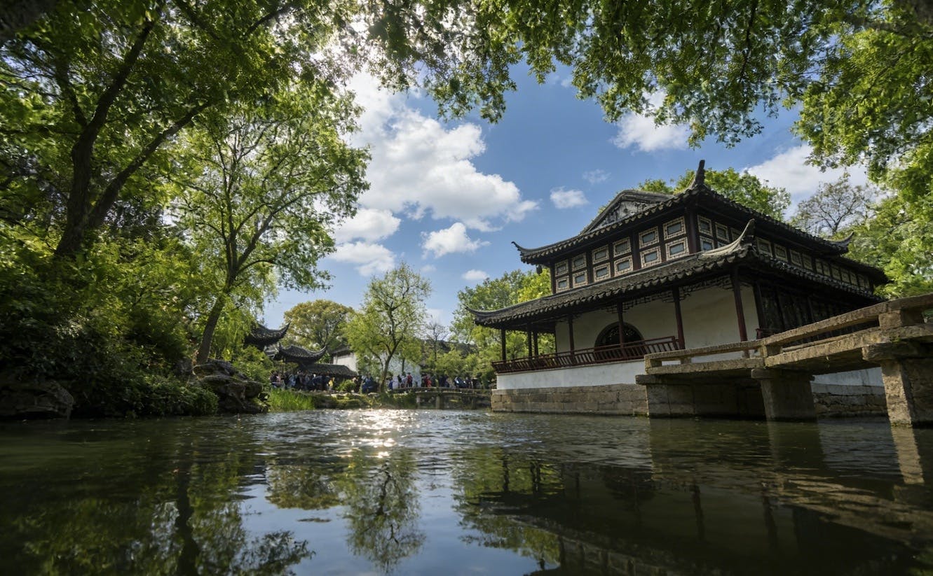 Bezoek aan de klassieke tuinen en waterstad vanaf Suzhou met pick-up