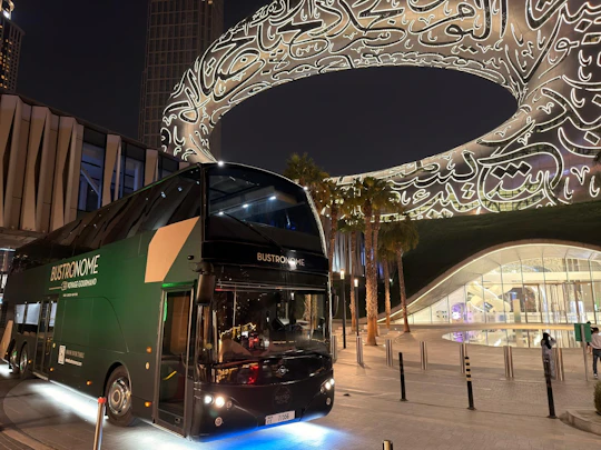 Dubai panoramic bus tour with gourmet dining experience