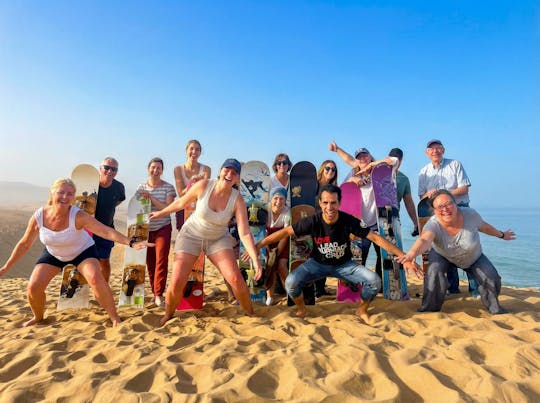 Sandboarden bij zonsondergang vanuit Agadir met BBQ-diner