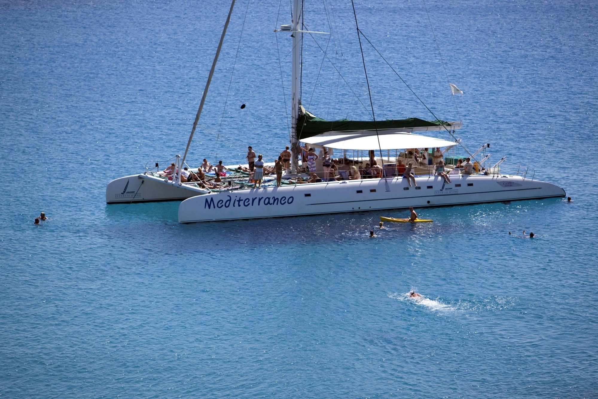 Sunset adults-only catamaran trip