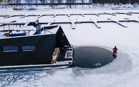 Helsinki contemporary seaside floating sauna experience