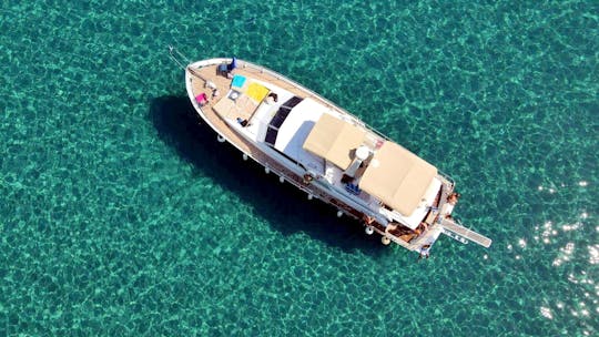 Rhodes adults-only yacht cruise with swim stops and lunch