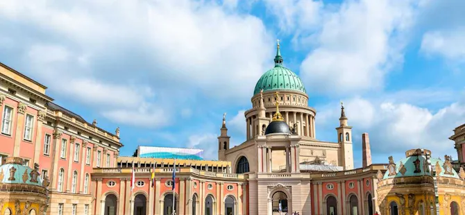 Sanssouci Palace in Potsdam with terraced gardens and Rococo architecture