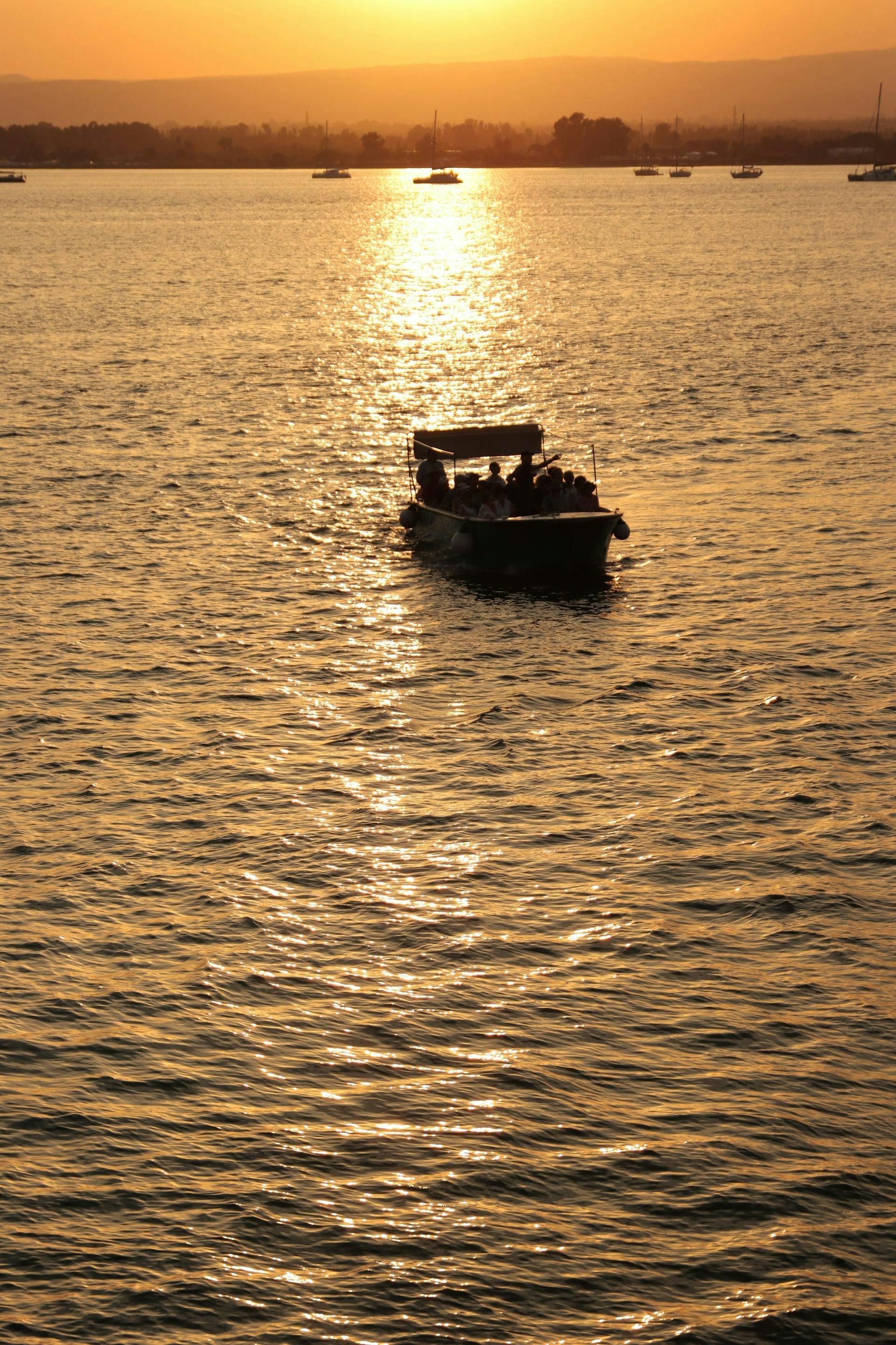 Sunset by boat in Terrasini with aperitif and swimming