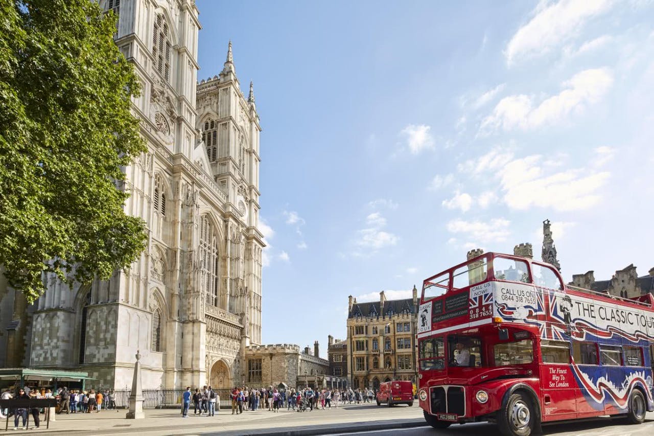 Vintage open-top bus tour with live guide in London