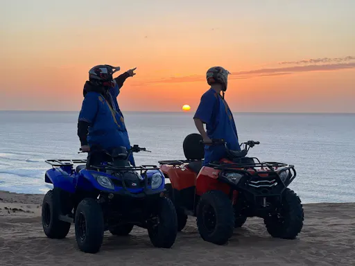 Quad biking, sandboarding and sunset camel ride with barbecue