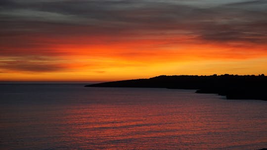 Passeio de paddleboarding ao pôr do sol em Cala Ratjada com snorkelling