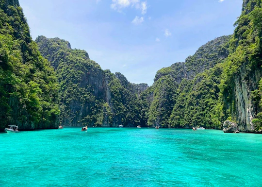Sunrise Phi Phi cove collection with longtail boat from Krabi