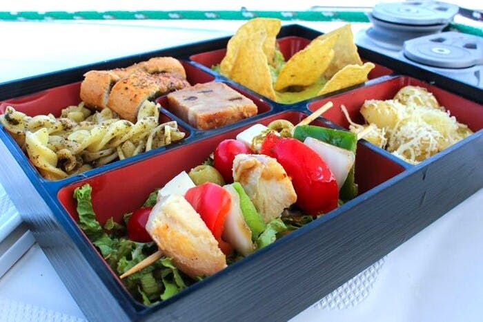 Full-day adults-only Riviera Maya boat trip with open bar and lunch