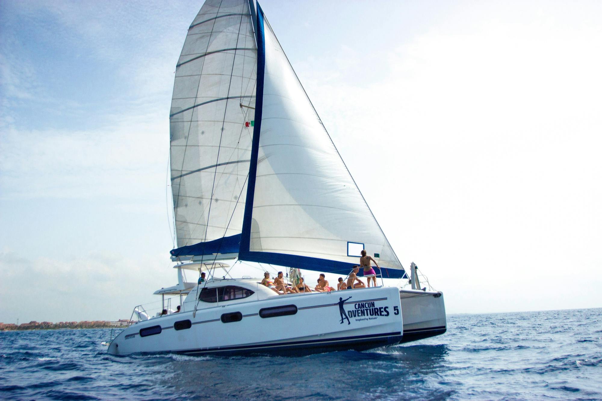 Full-day adults-only Riviera Maya boat trip with open bar and lunch