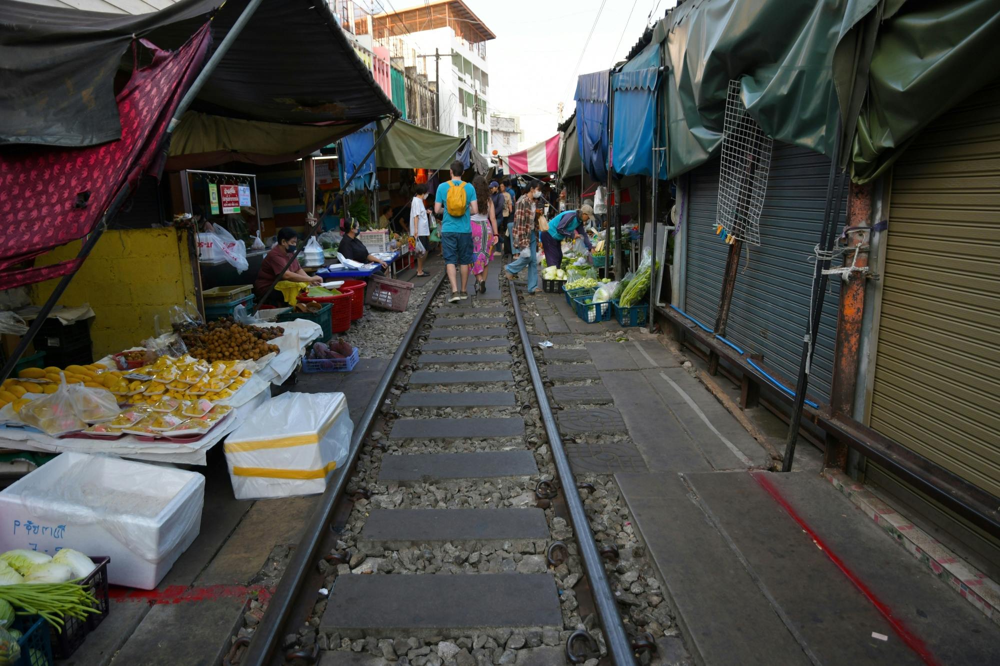 Railway market, floating market, salt farm and cycling tour from Hua Hin