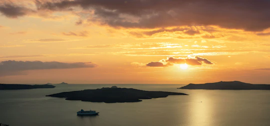 Santorini luxurious sunset catamaran cruise with barbecue and drinks