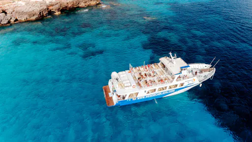 Half-day boat cruise in Menorca with beach stop