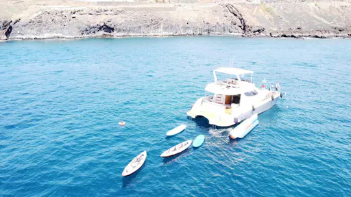 Small group catamaran cruise with water sports and transport