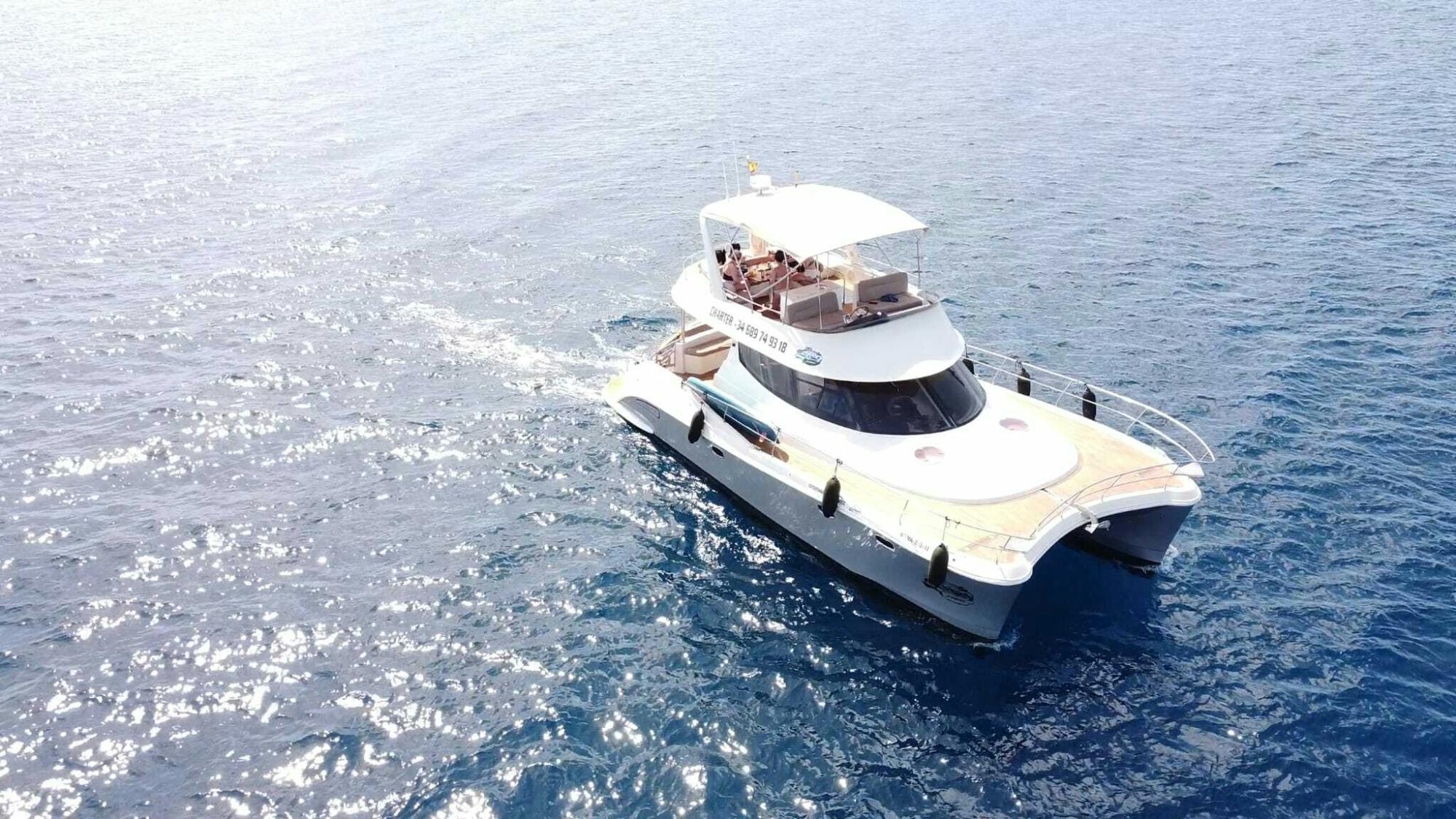 Small group catamaran cruise with water sports and transport