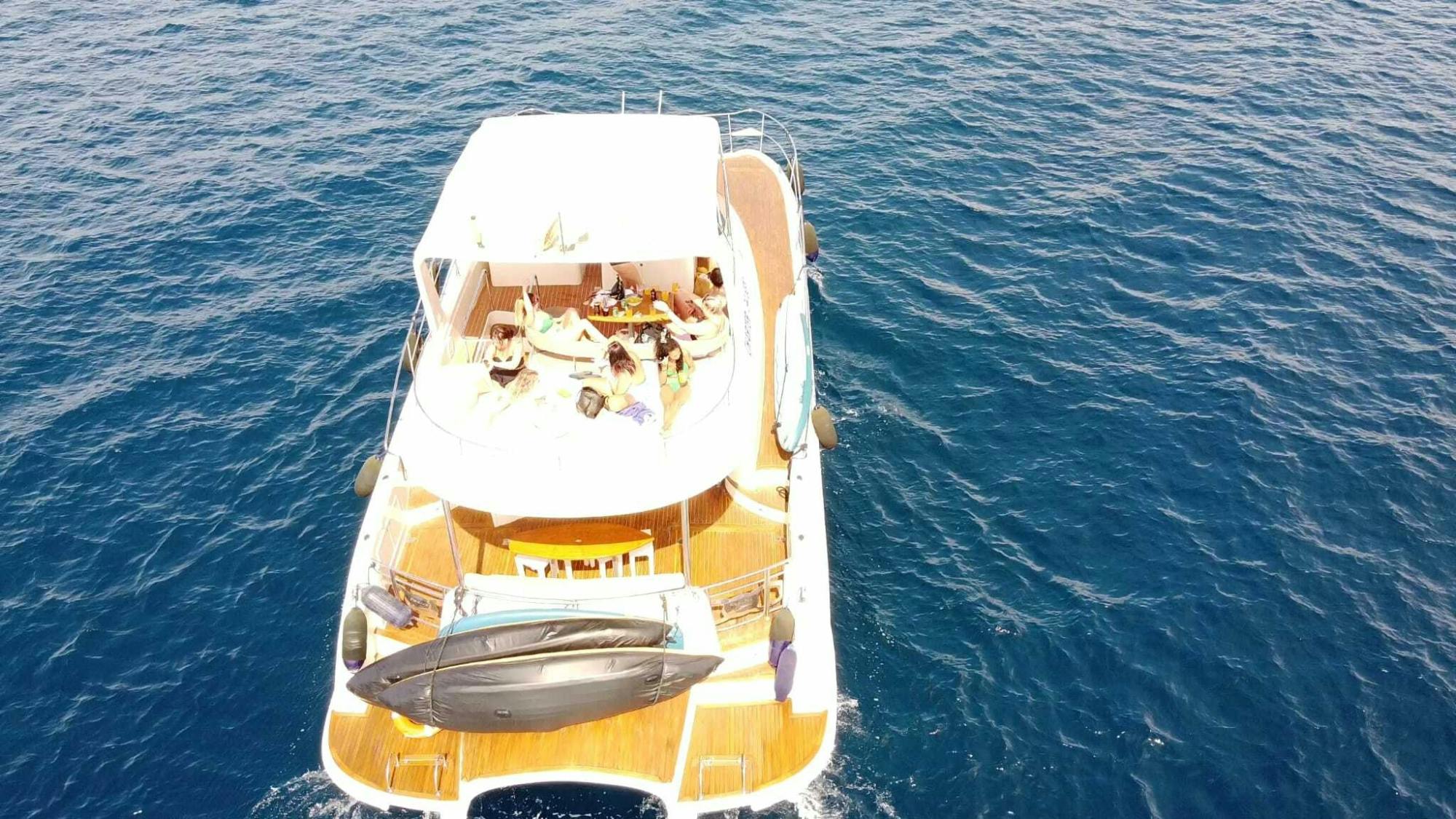Small group catamaran cruise with water sports and transport