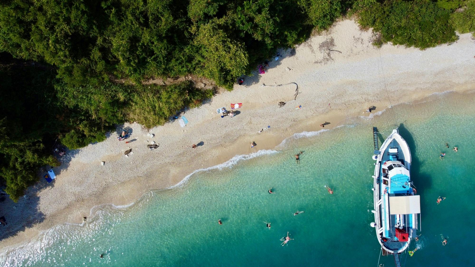 Corfu Blue Caves cruise with swim stops, lunch and optional transfers