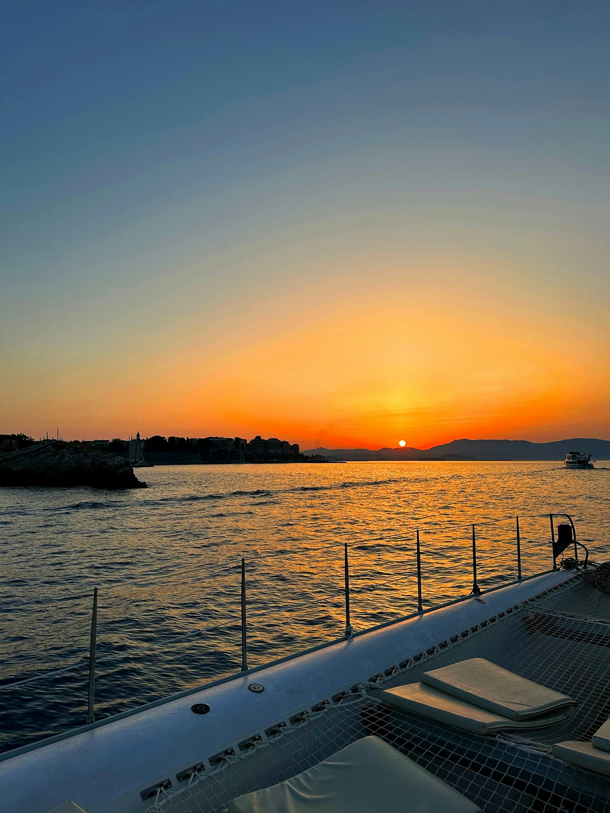 Adults-only Corfu sunset catamaran cruise with drinks, snacks and optional transfers