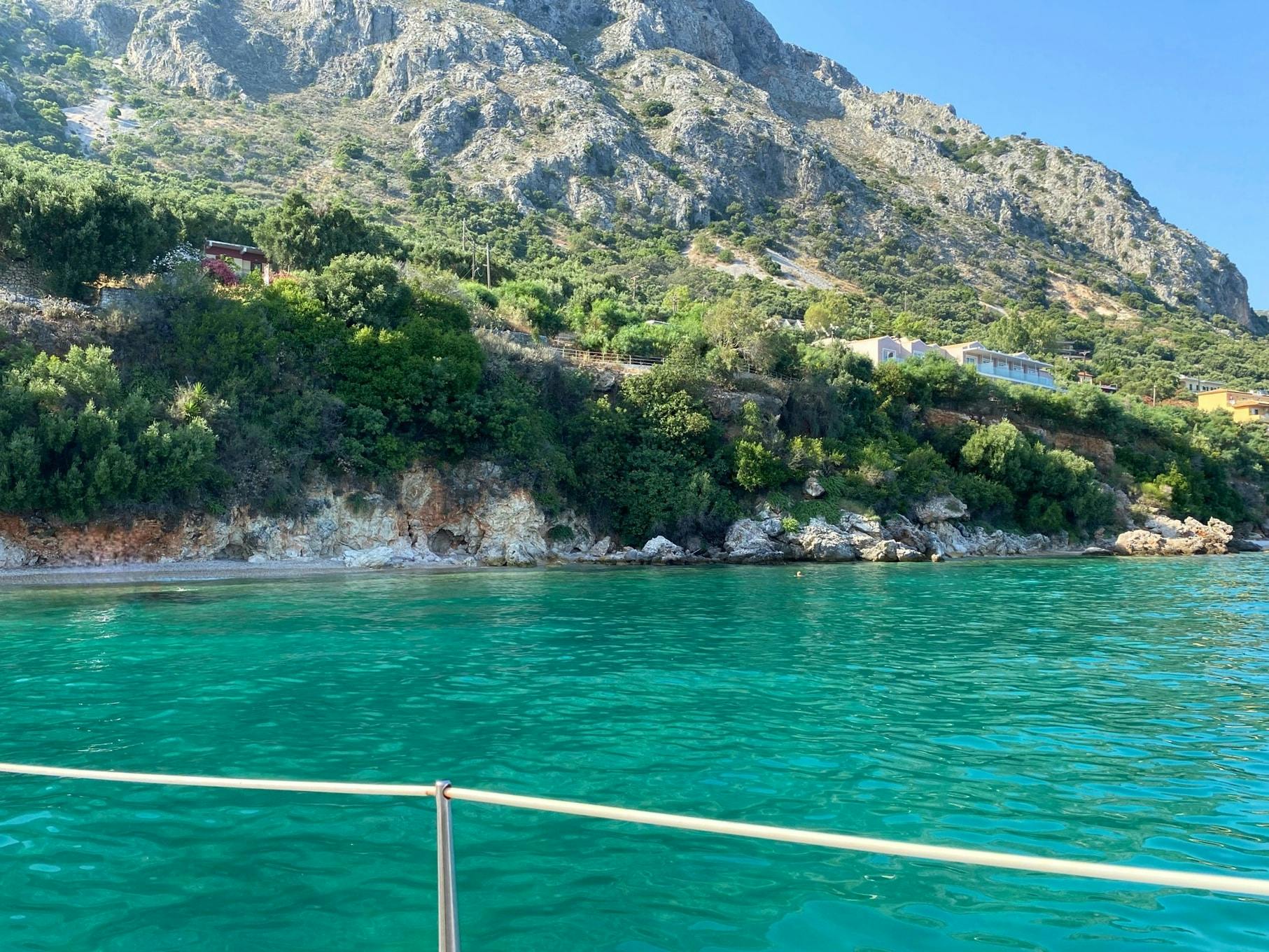 Corfu east coast catamaran cruise with drinks, snacks and optional transfers
