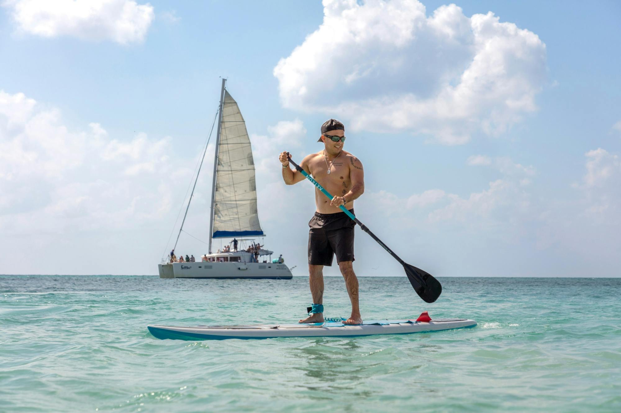 Full-day adults-only Riviera Maya boat trip with open bar and lunch