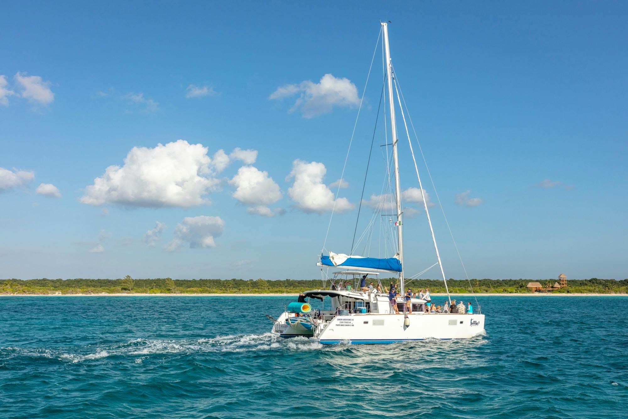 Full-day adults-only Riviera Maya boat trip with open bar and lunch