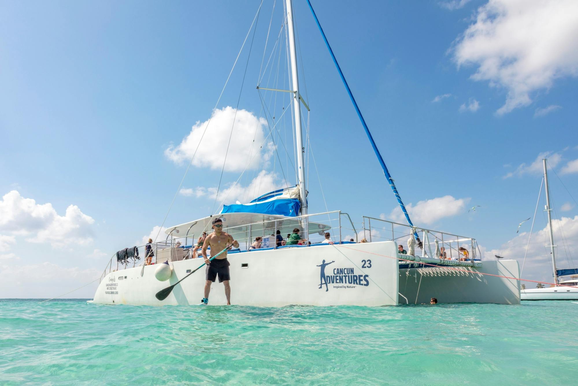Full-day adults-only Riviera Maya boat trip with open bar and lunch